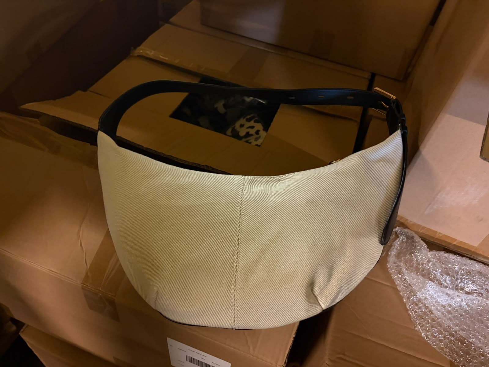 M&S Canvas and leather-look half-moon shoulder bag (cream with black strap)