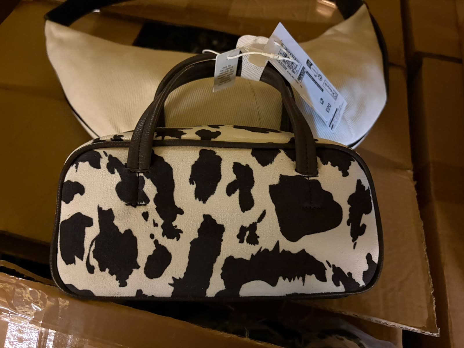 M&S Cow print mini handbag with brown handles